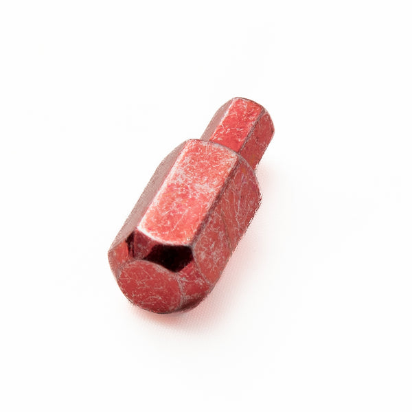 Close-up view of the Hex Devil 5.5mm hex head bit showing the metallic marbled red finish