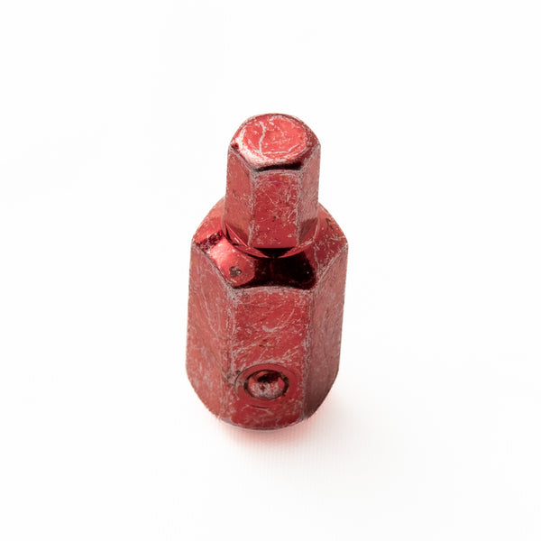Hex Devil bit standing vertically showing the spring-loaded ball detent and 3/8 inch socket attachment